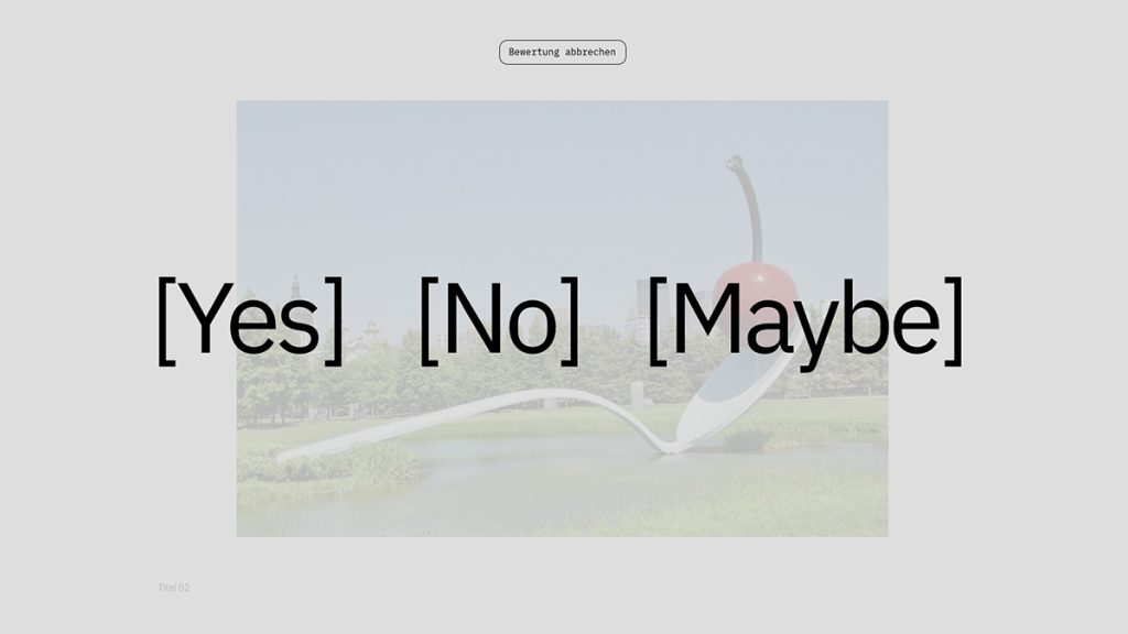 Screenshot aus einer Website mit einer Darstellung einer Skulptur in Löffelform. Darüber platziert ist der Schriftzug "[Yes] [No] [Maybe]"